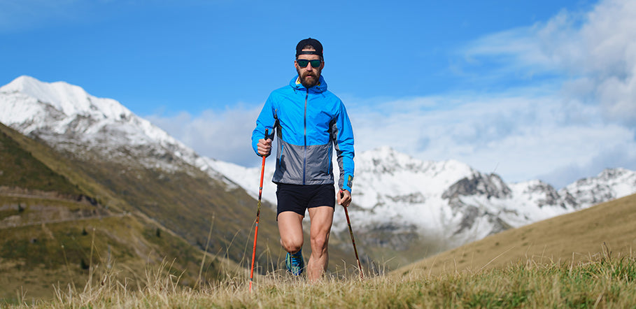 person using hiking poles
