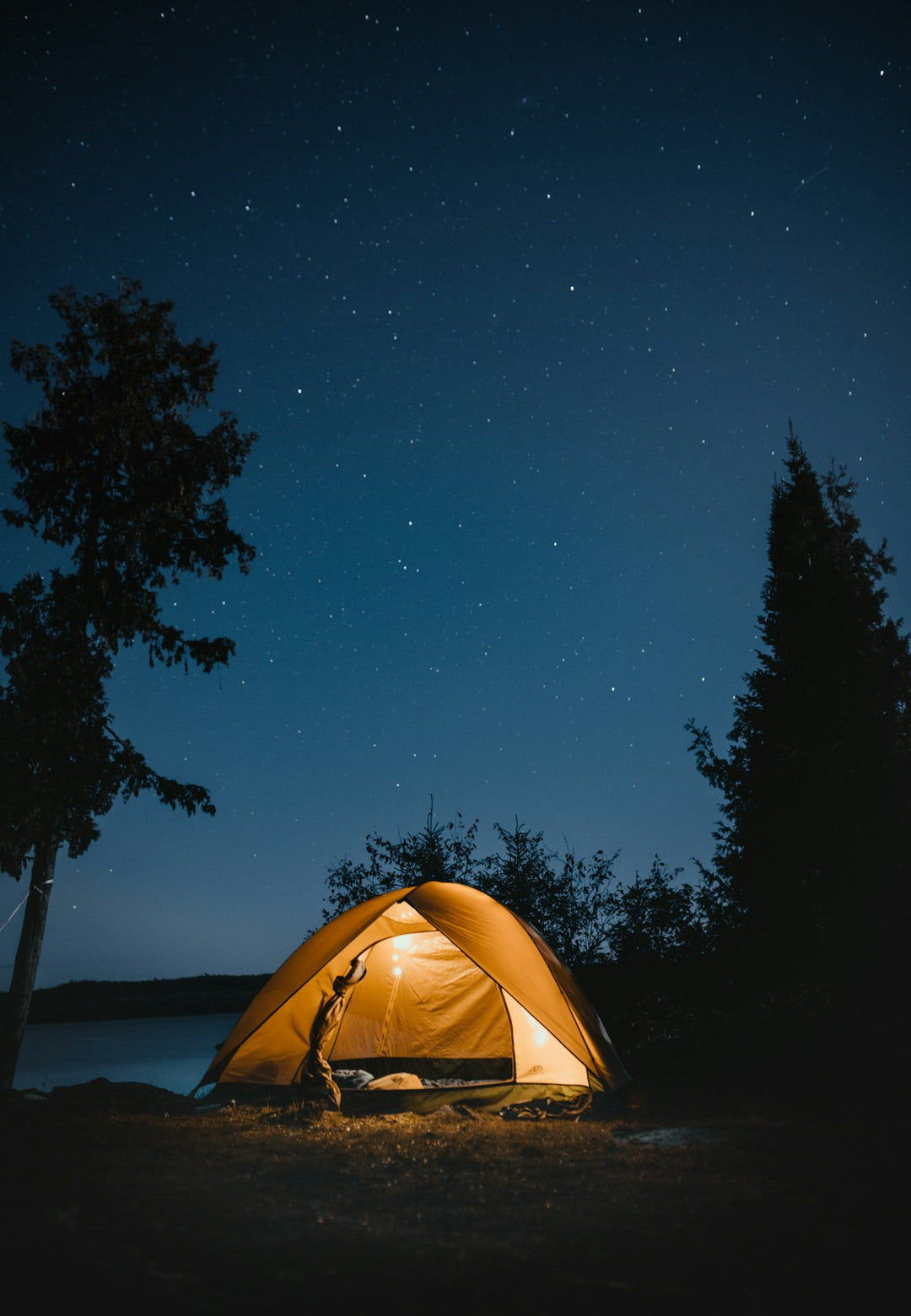 Tent under a starry sky in the backcountry — best ultralight hiking tents NZ