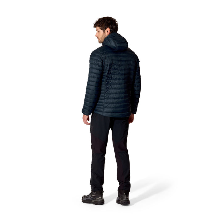 Full-length rear view of a man wearing the Rab Microlight Alpine Down Hoody in Galaxy Blue.