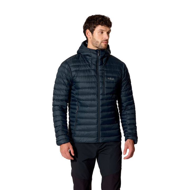 Man wearing the Rab Microlight Alpine Down Hoody in Galaxy Blue, three-quarter front view.