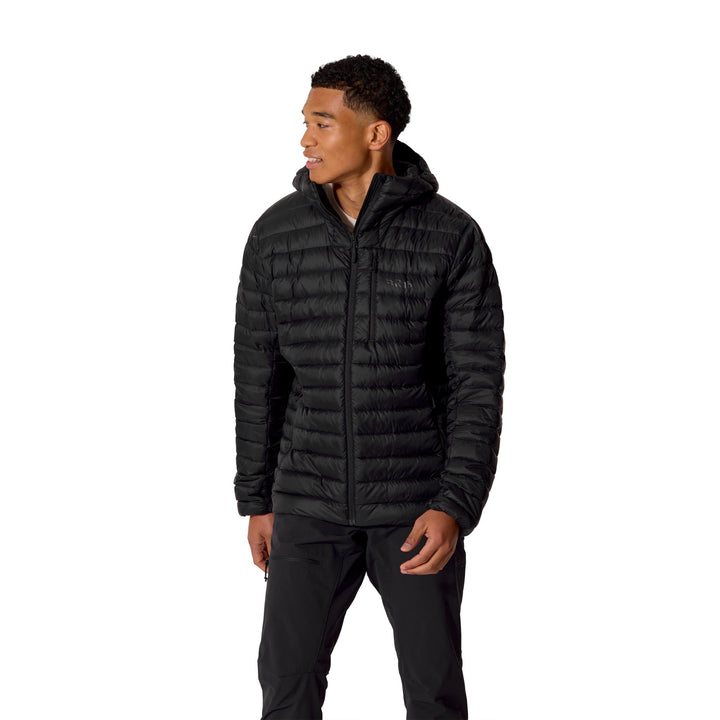 Man wearing the Men’s Rab Microlight Alpine Down Hoody in Black, three-quarter front fit view.