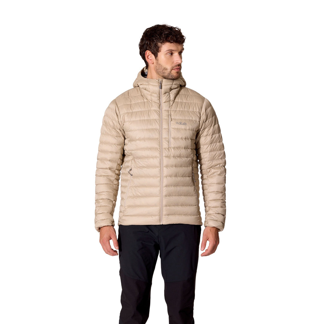 Man wearing the Men’s Rab Microlight Alpine Down Hoody in Dark Pebble, three-quarter front fit view.