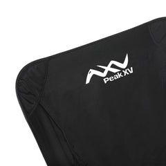 Close-up of black chair fabric and Peak XV logo